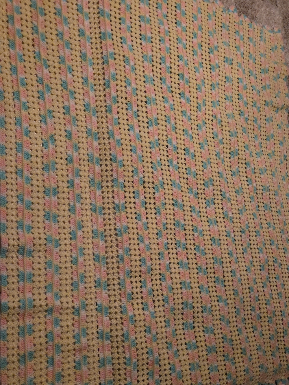 Soft Cream Crochet Blanket with Pink and Blue Accents